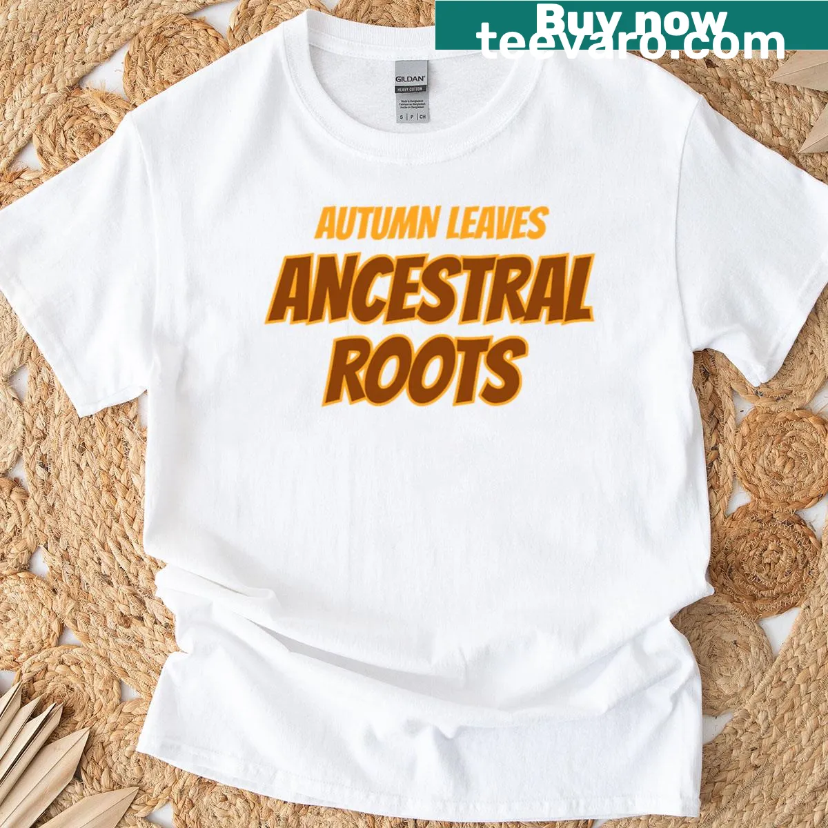 Illustration of autumn leaves and roots symbolizing heritage — on a men's t-shirt