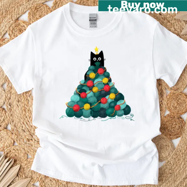 Cute T-shirt featuring a black cat and yarn on a Christmas tree design.