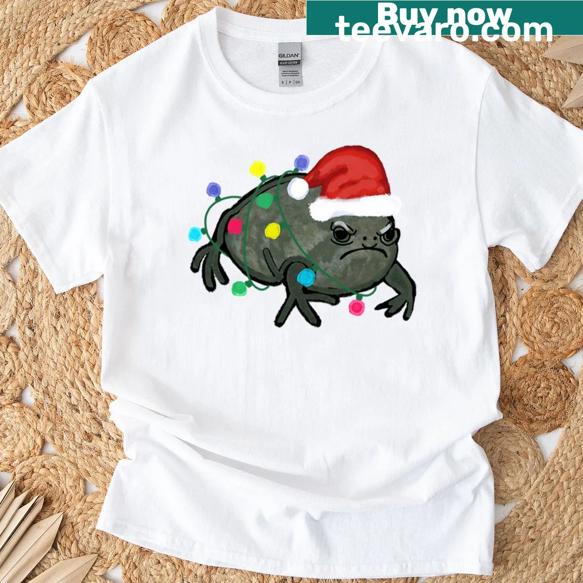 Festive graphic of a frog in a Santa hat with Christmas lights — on a men's t-shirt