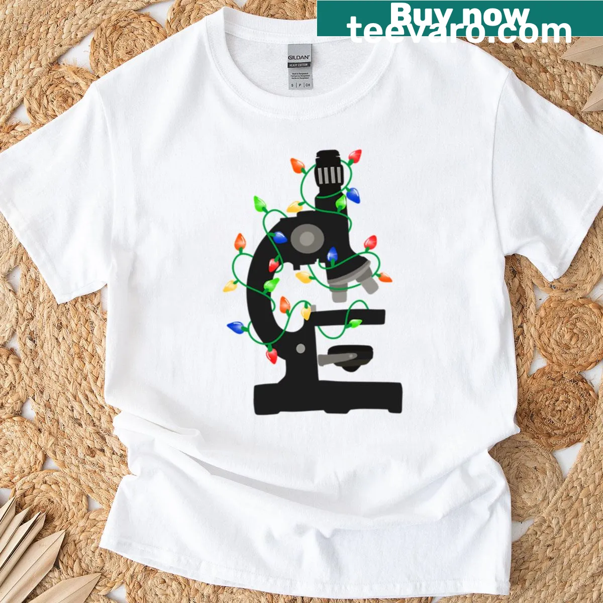 Christmas-themed tee featuring a microscope illustration — on a men's t-shirt