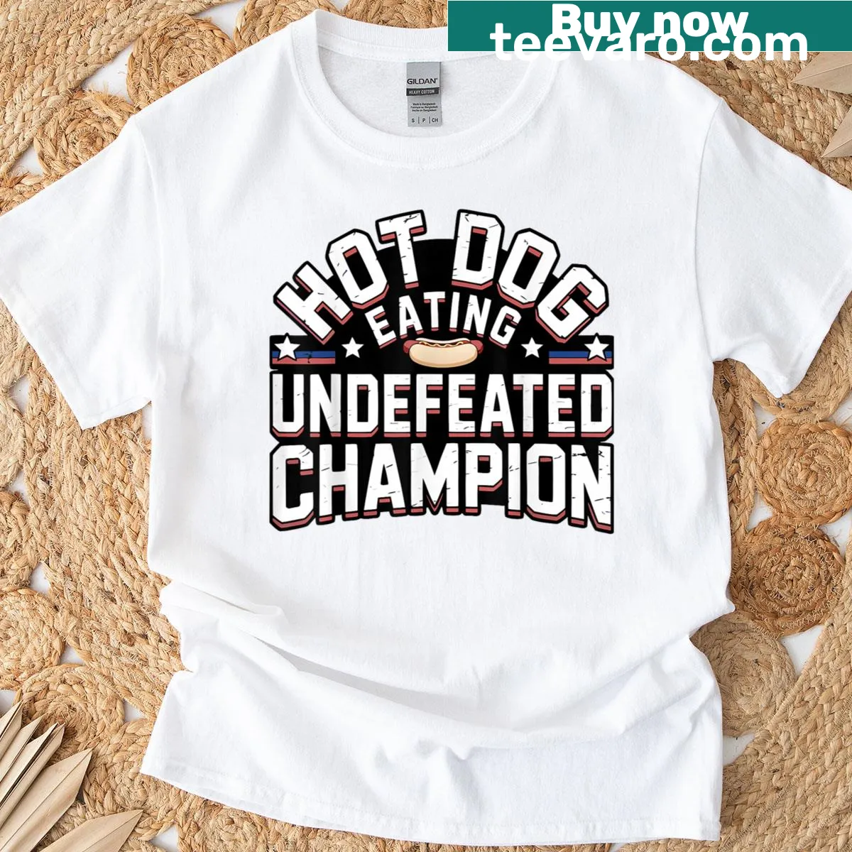 Champion hot dog eating t-shirt with bold typography — on a men's t-shirt