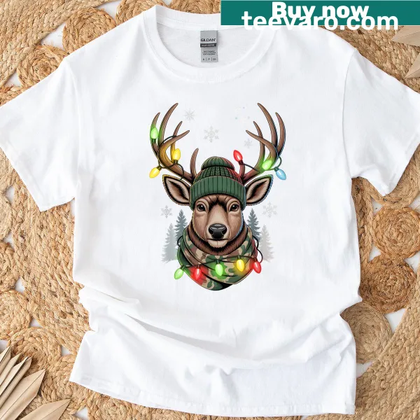T-shirt featuring a humorous deer wearing Christmas lights, a beanie, and a camo scarf