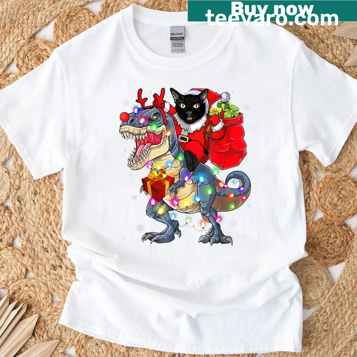 Santa cat riding dinosaur with Christmas lights t-shirt — on a men's t-shirt