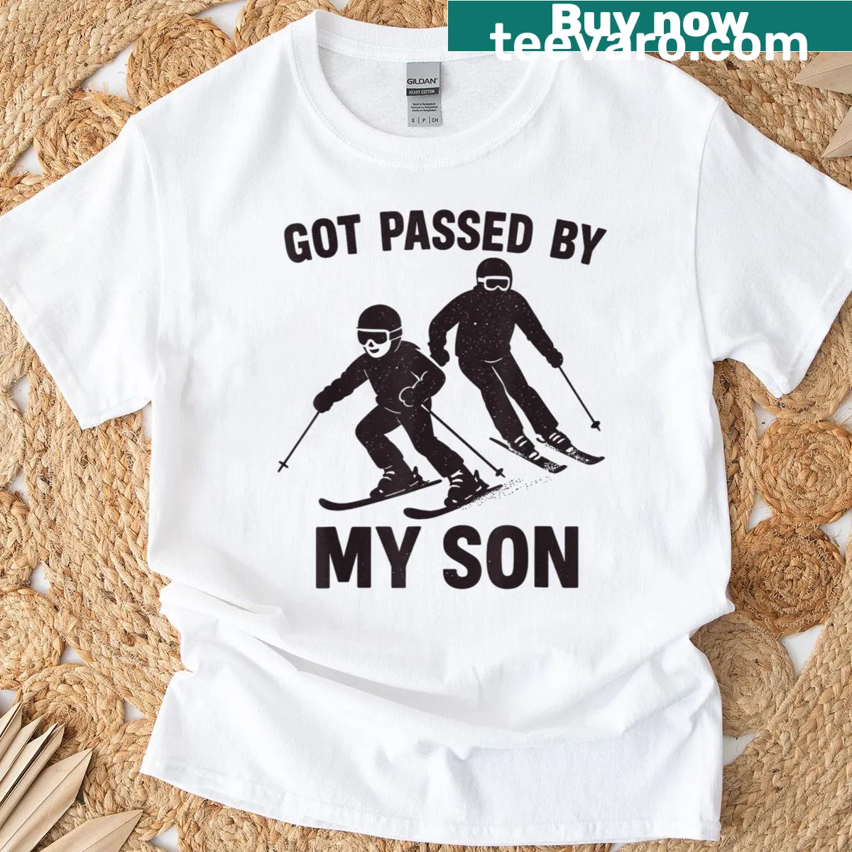 Family skiing t-shirt with humorous graphic of dad and son. — on a men's t-shirt