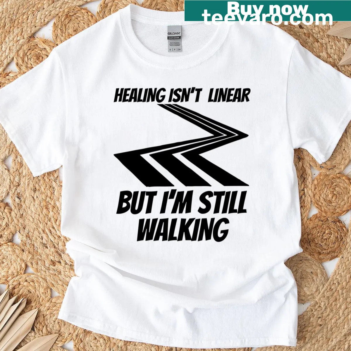 Empowering T-shirt featuring 'Healing Isn't Linear' mental wellness message — on a men's t-shirt