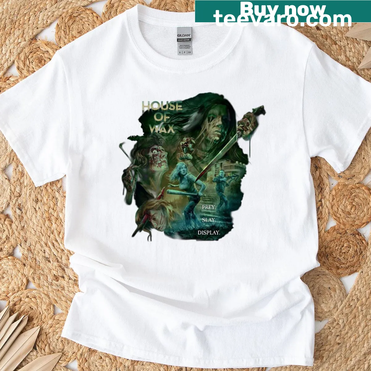 House Of Wax 2005 horror-themed t-shirt with wax figure graphics — on a men's t-shirt