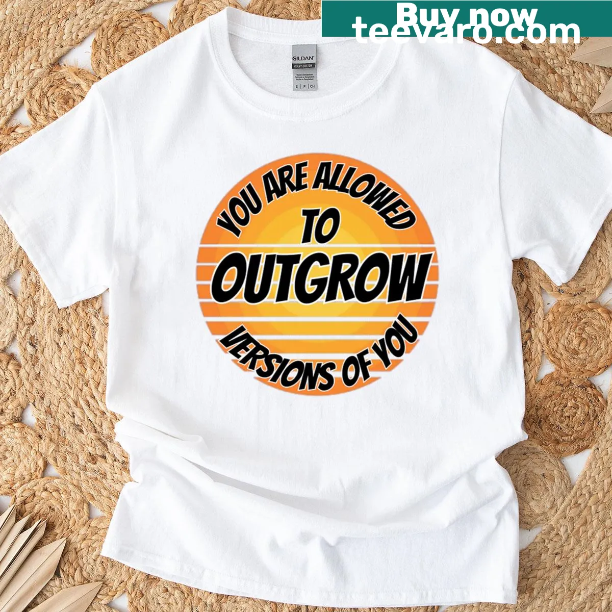 Inspirational t-shirt with 'Outgrow Your Past' quote — on a men's t-shirt