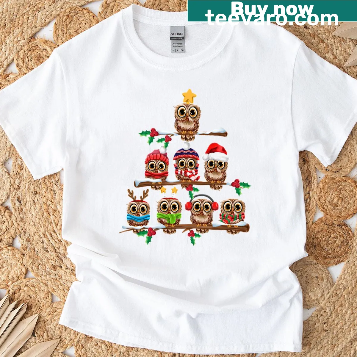 Cute Christmas T-shirt featuring an owl sitting on a decorated tree — on a men's t-shirt