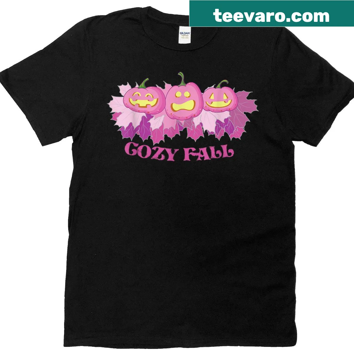 Whimsical fall-themed T-shirt with pink pumpkins and glowing eyes — on a men's t-shirt