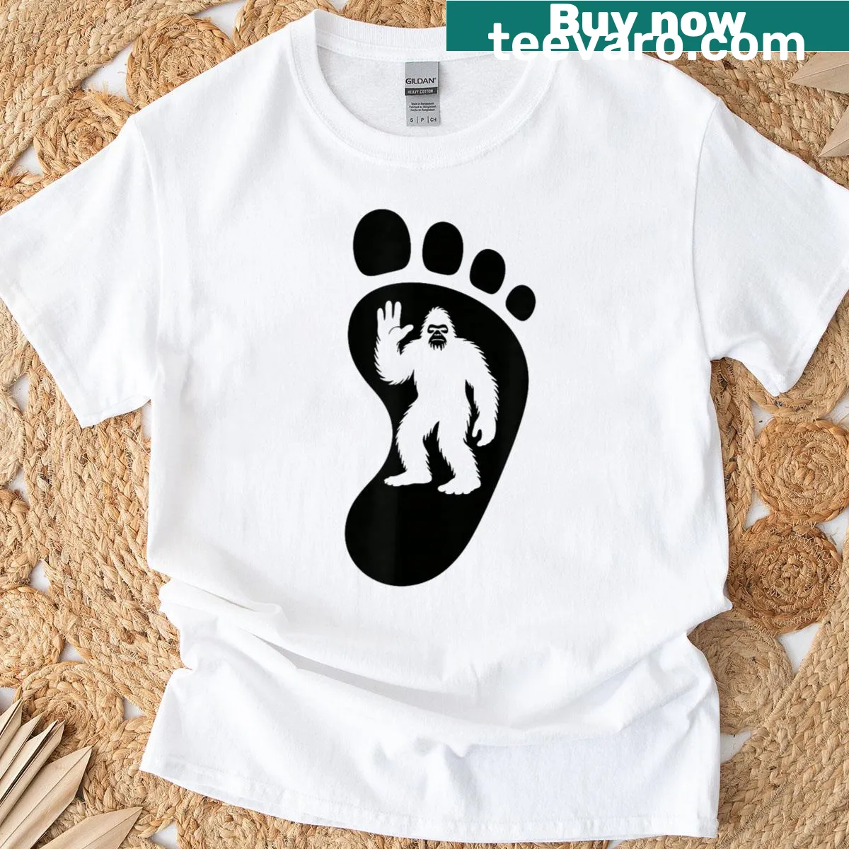 Sasquatch footprint silhouette t-shirt for cryptid believers — on a men's t-shirt