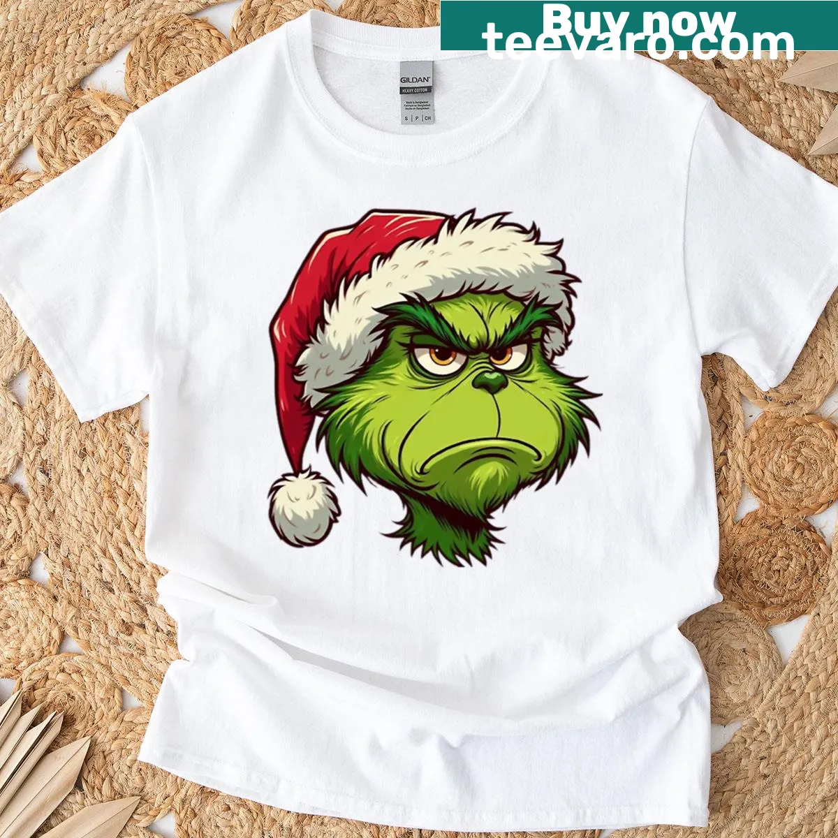T-shirt featuring a whimsical Grinch design — on a men's t-shirt