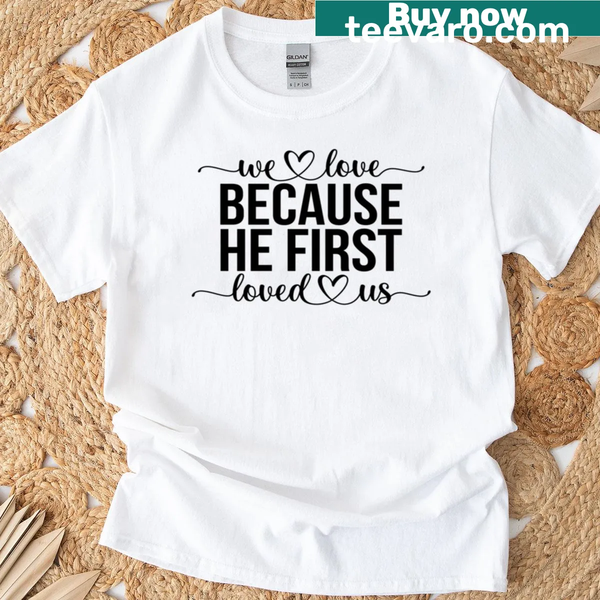 Inspirational T-shirt with the text from 1 John 4:19 — on a men's t-shirt