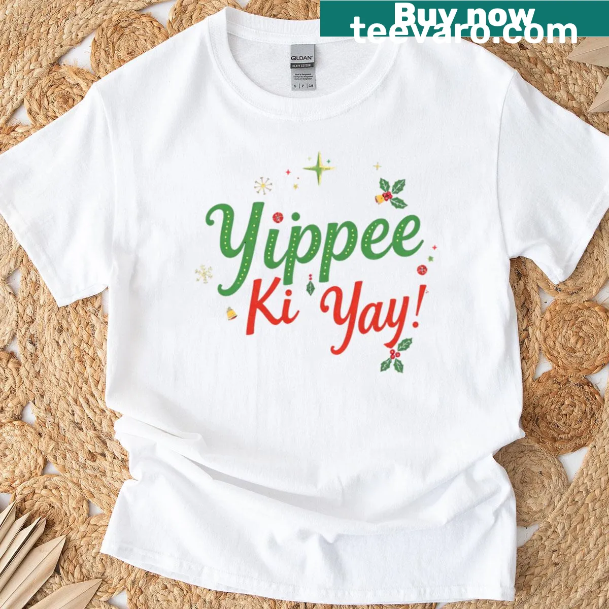 T-shirt featuring the phrase Yippee Ki Yay in playful typography — on a men's t-shirt