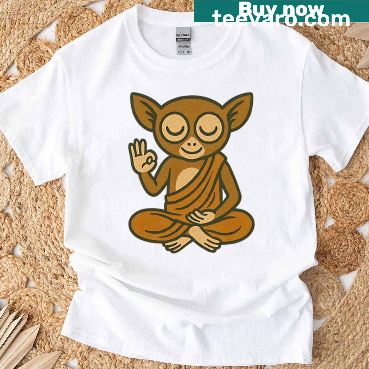 Adorable tarsier meditating in a cute Zen art design — on a men's t-shirt