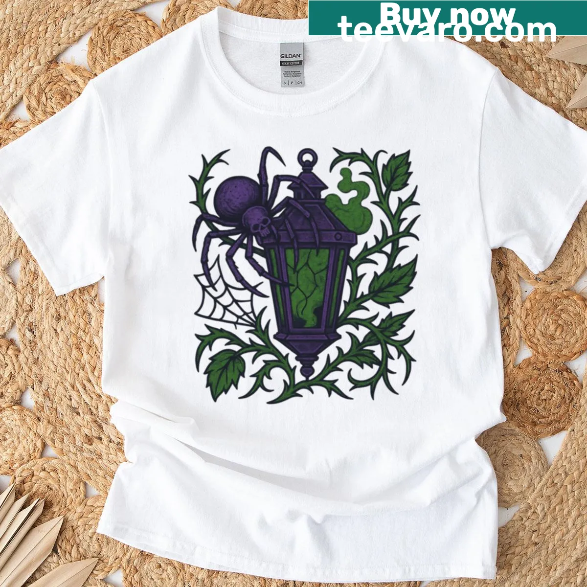 Gothic skull with spider and lantern design on dark shirt — on a men's t-shirt