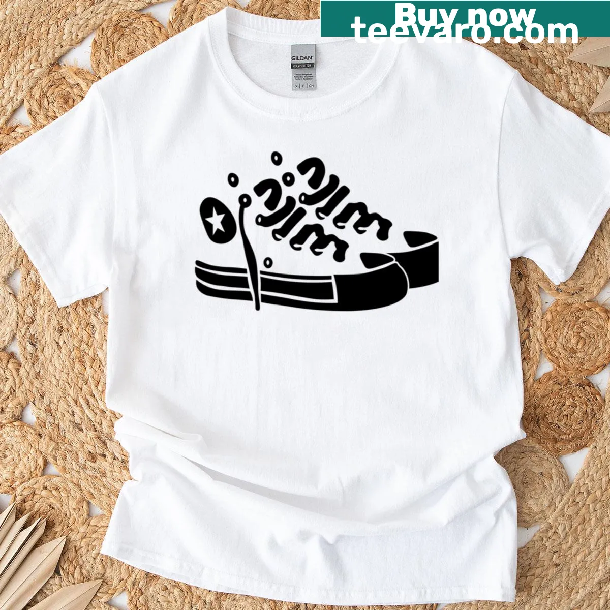 Retro T-shirt featuring a graphic of high-top sneakers. — on a men's t-shirt