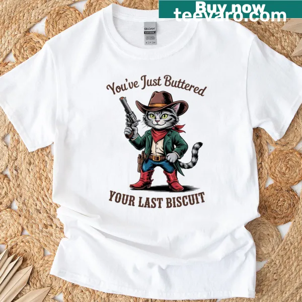 Whimsical T-shirt featuring a cat and donuts illustration