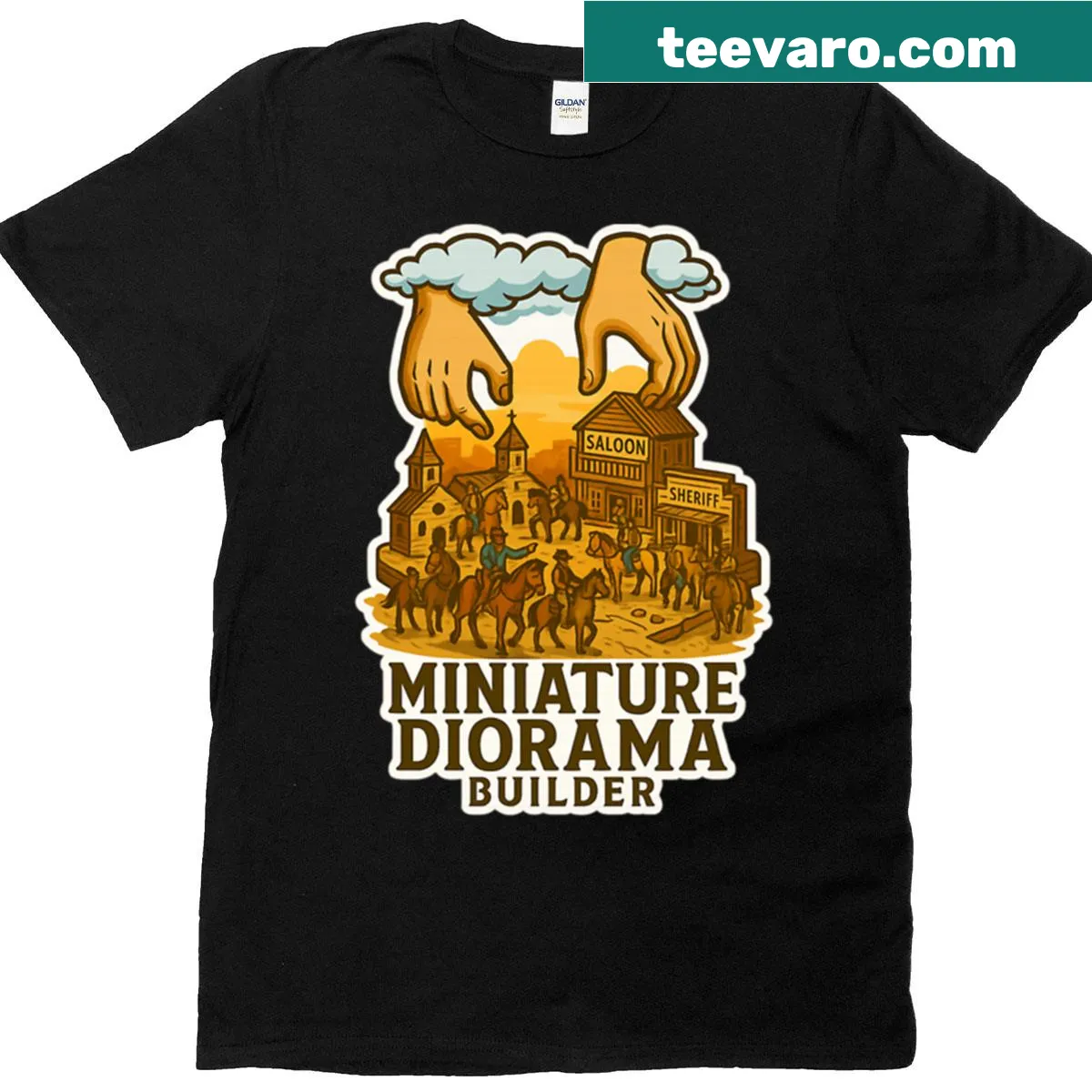 T-shirt featuring a miniature cowboy town design — on a men's t-shirt