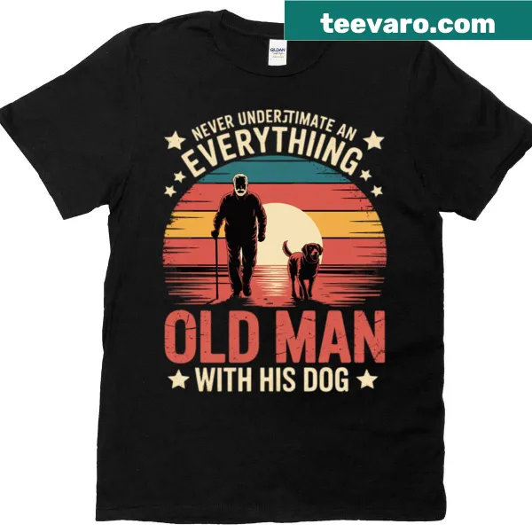 Funny text graphic stating 'Never Underestimate An Old Man With His Dog' on a t-shirt.