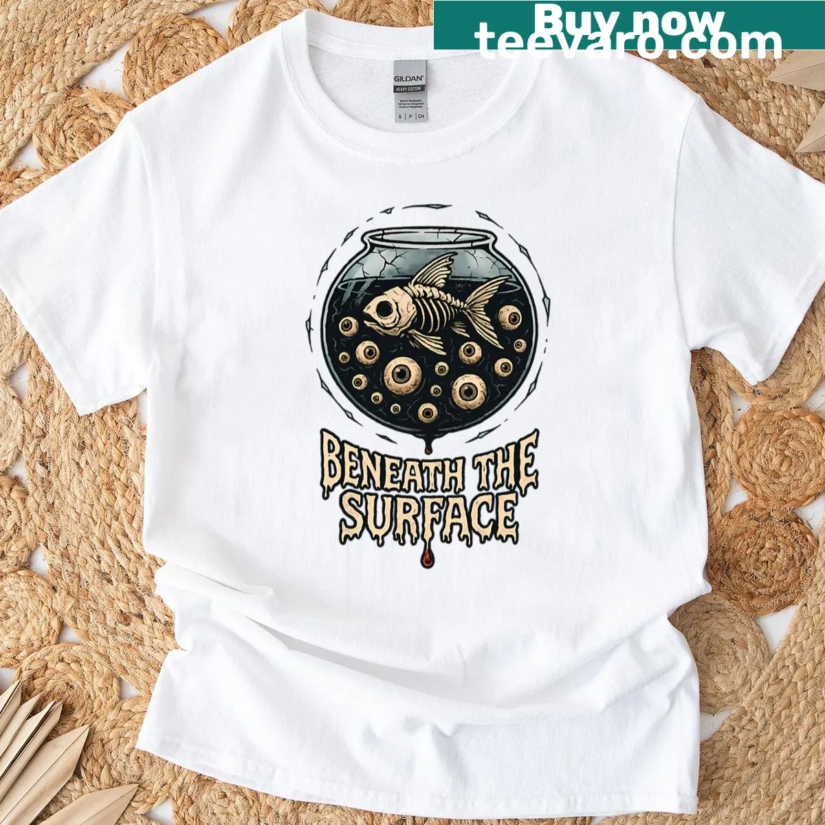 Gothic t-shirt featuring a skeletal goldfish in a horror-themed bowl — on a men's t-shirt