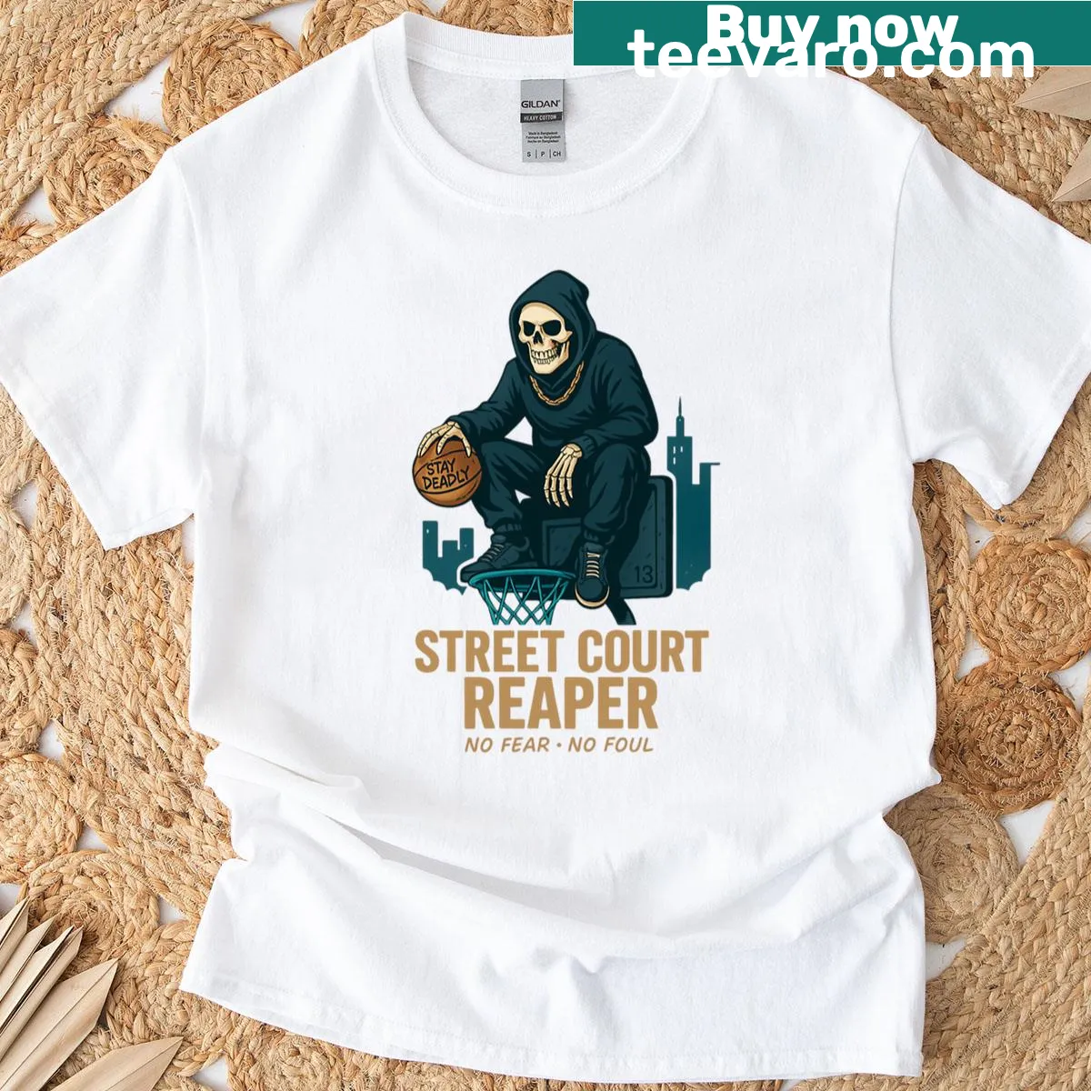 Urban basketball skeleton reaper graphic t-shirt — on a men's t-shirt