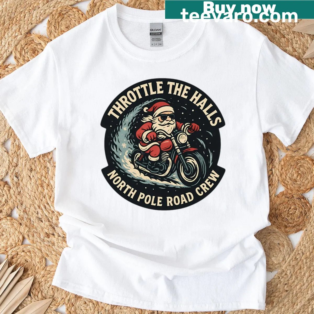 Retro biker Santa badge design on Christmas-themed t-shirt — on a men's t-shirt