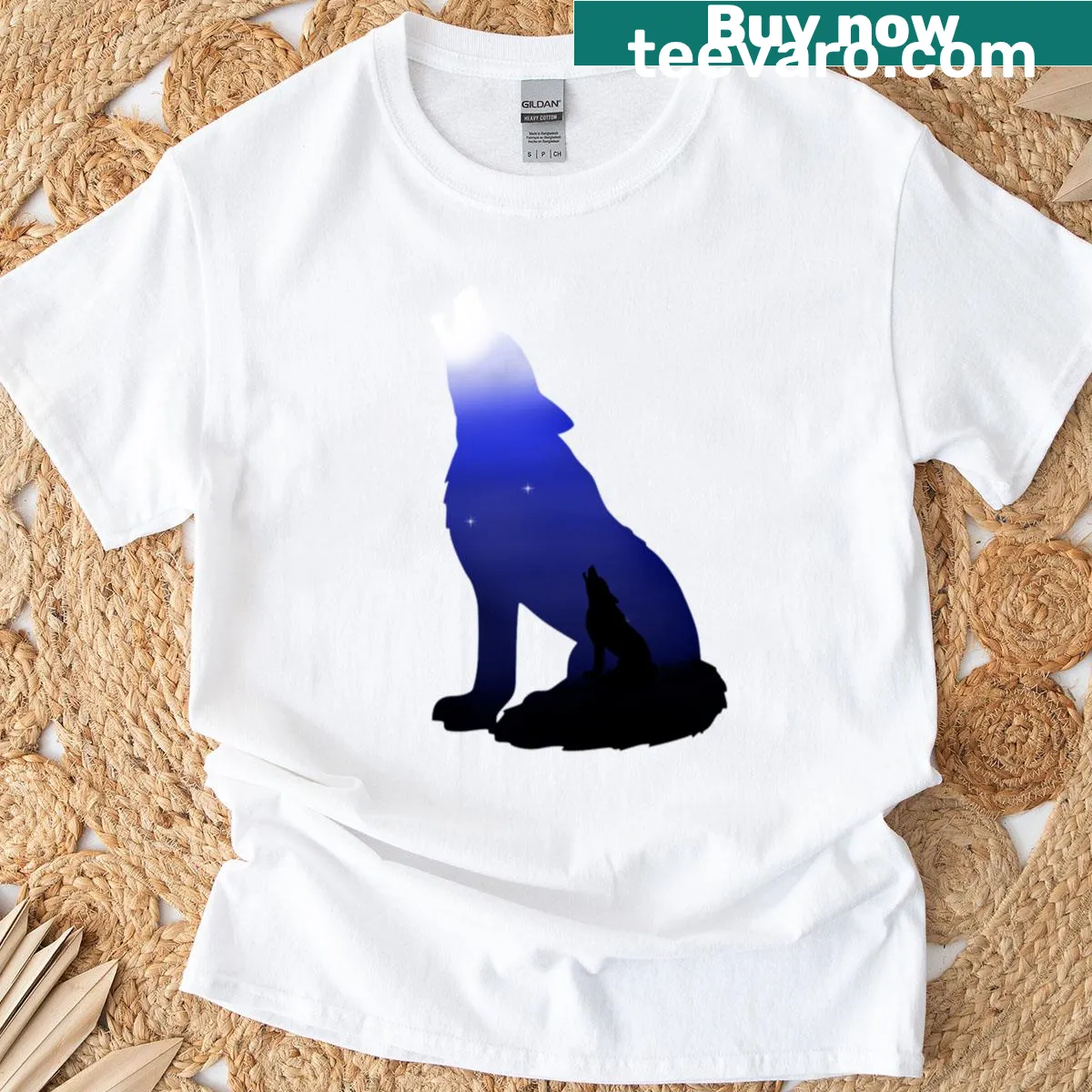 T-shirt featuring a wolf howling at the moon illustration — on a men's t-shirt