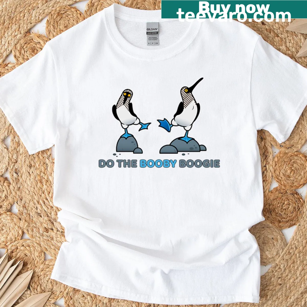 Playful Blue Footed Booby dancing graphic T-shirt — on a men's t-shirt