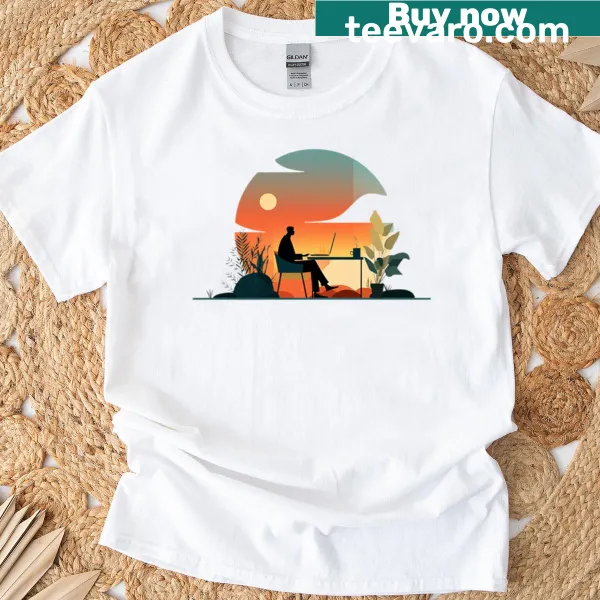 Calm sunset scene graphic T-shirt featuring a desk worker.