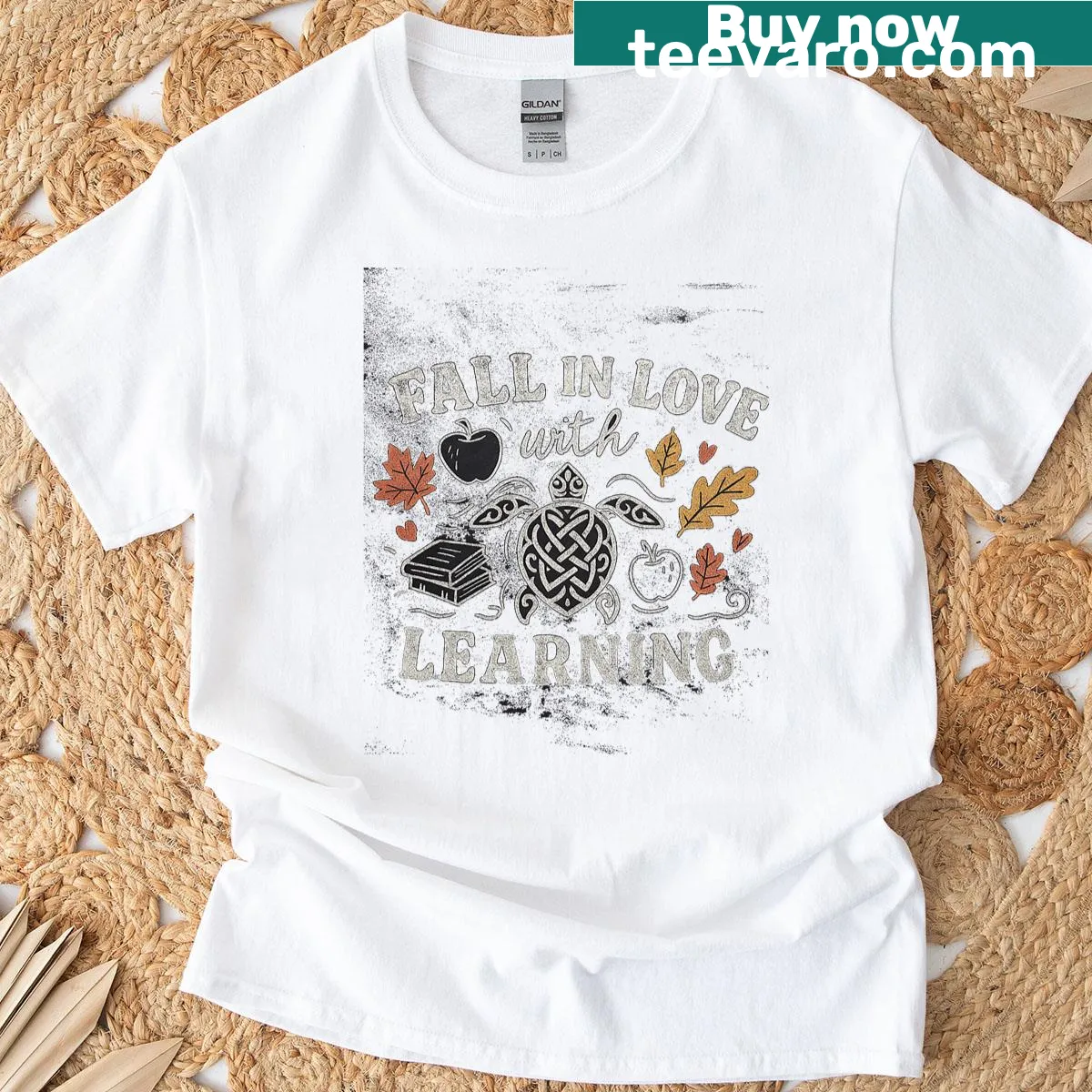 Cute T-shirt with a sea turtle graphic and 'Fall In Love With Learning' text. — on a men's t-shirt