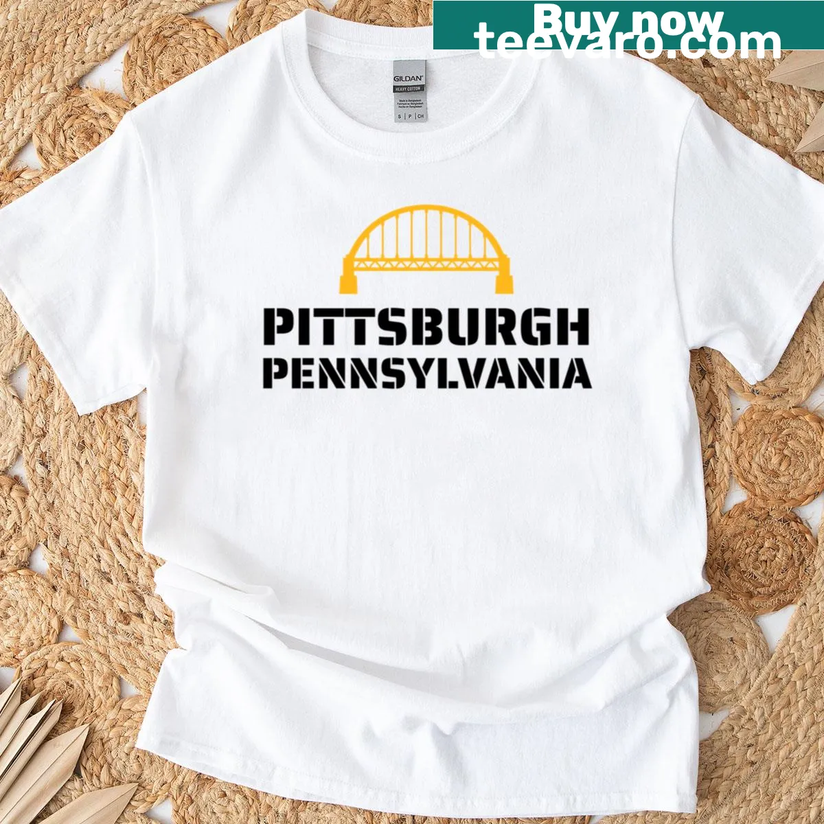 Minimalist gold and black Fort Pitt Bridge graphic T-shirt — on a men's t-shirt
