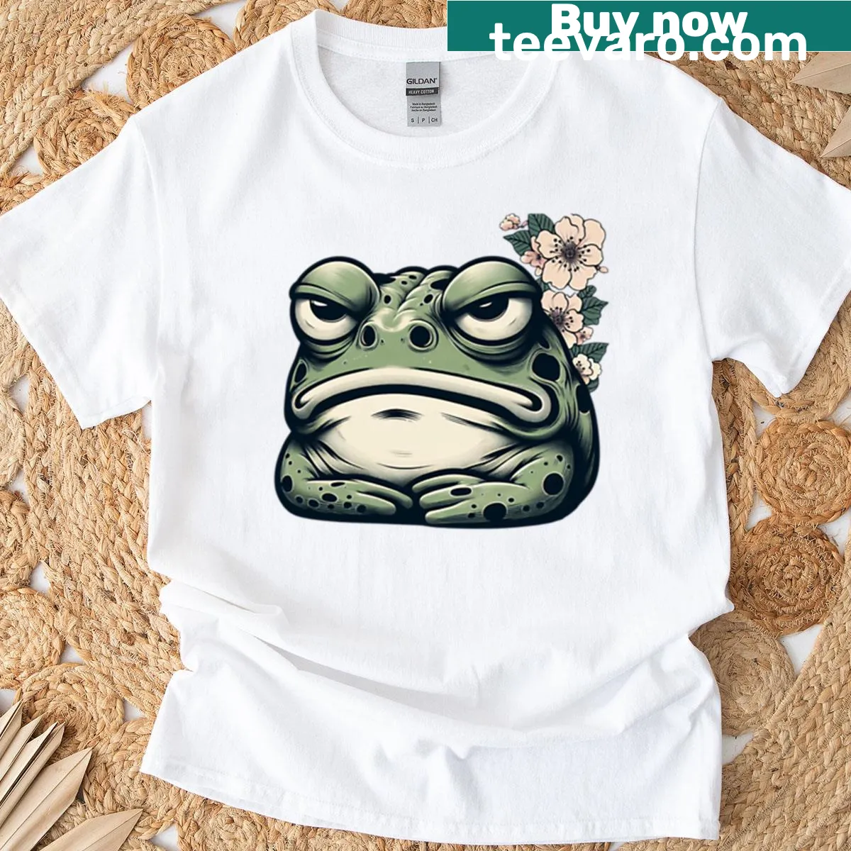 Illustration of a grumpy frog with flowers in a cottagecore style — on a men's t-shirt