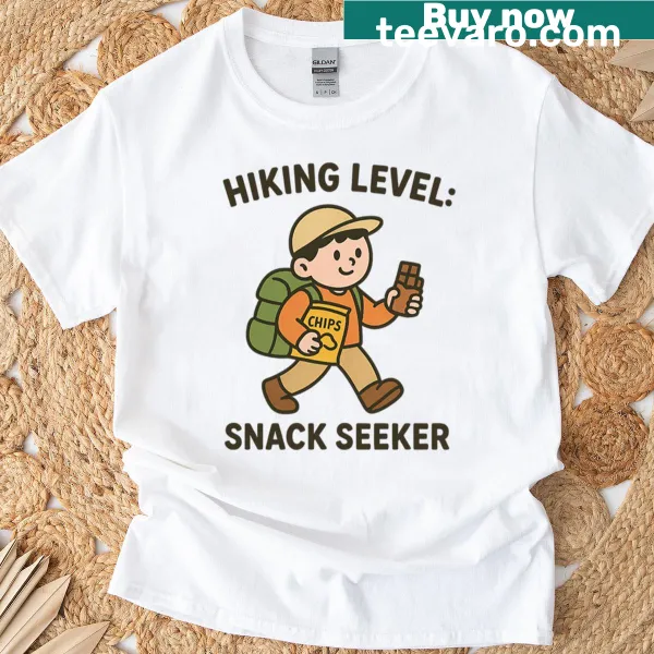 Funny hiking T-shirt declaring 'Snack Seeker' with playful typography