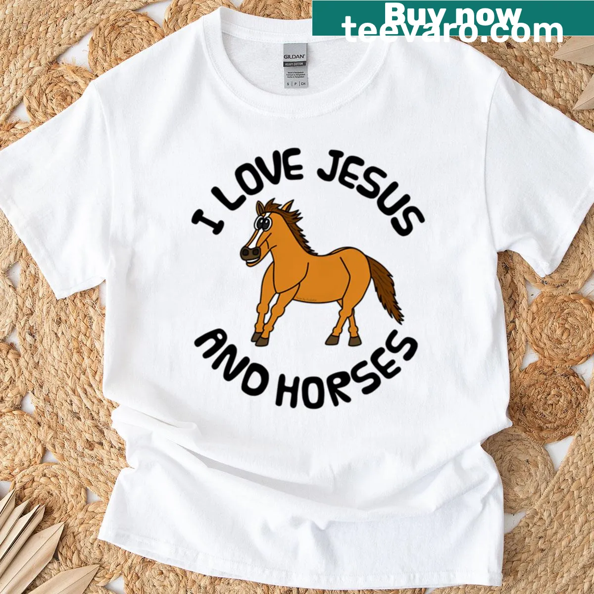 Graphic tee featuring 'I Love Jesus And Horses' with an illustration of horses. — on a men's t-shirt