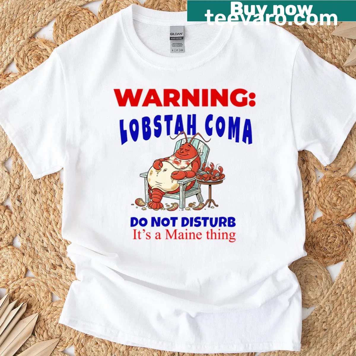 T-shirt featuring a playful lobster illustration — on a men's t-shirt