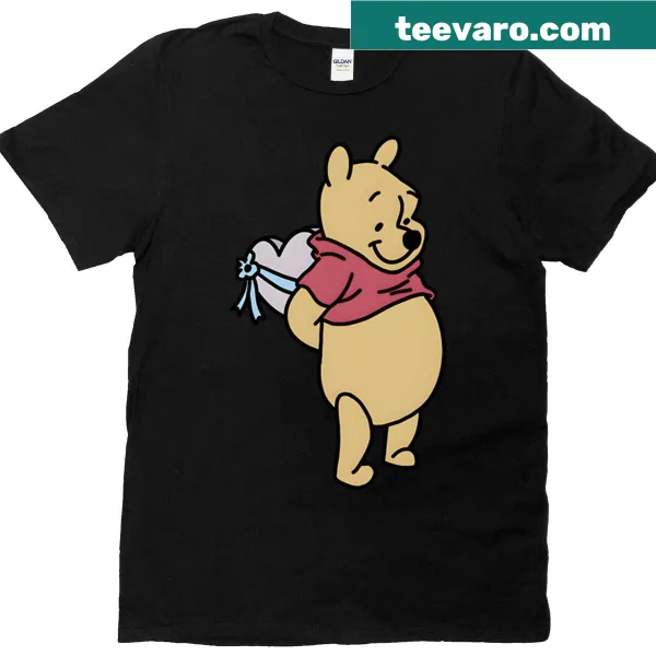 Winnie the Pooh holding a gift on a T-shirt