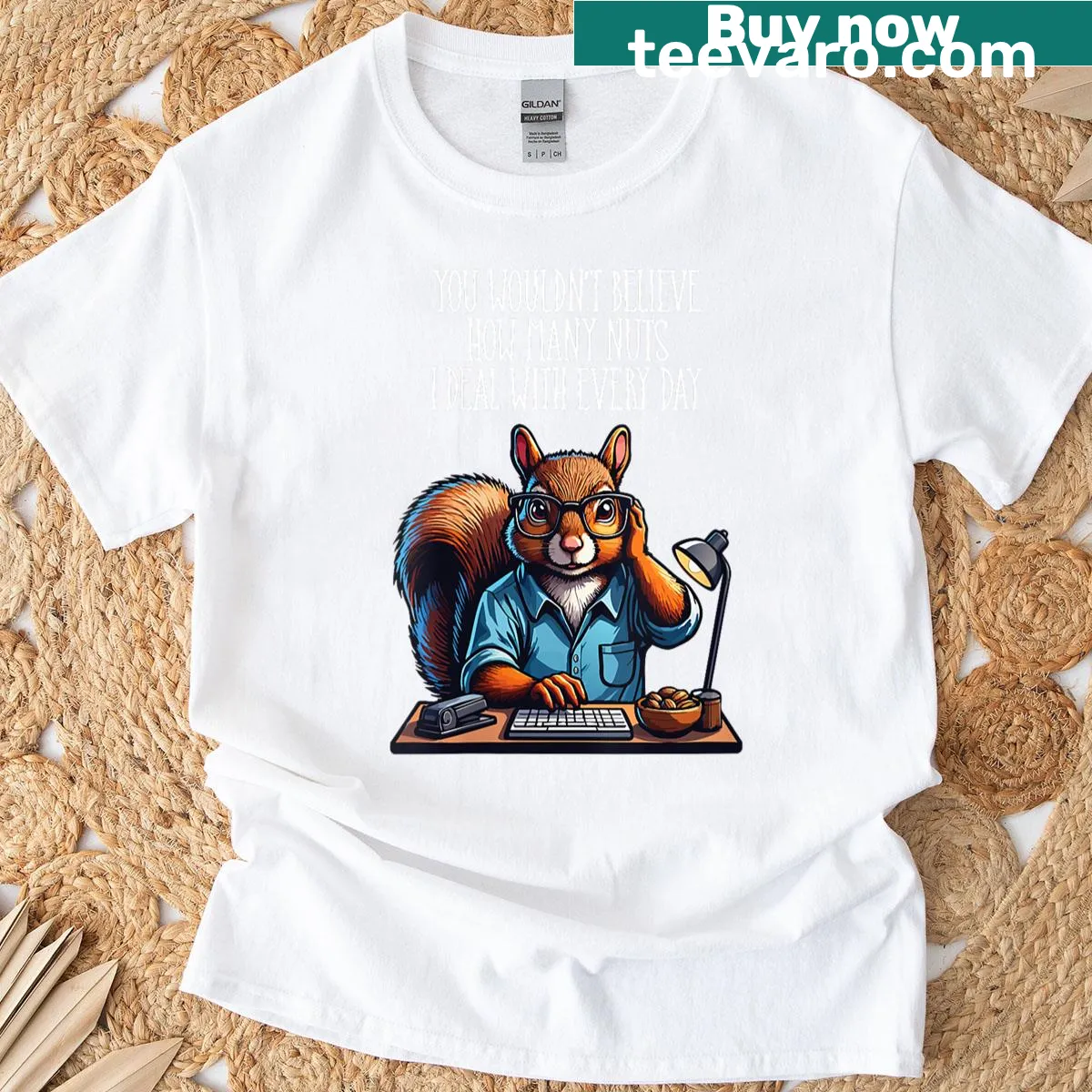 Funny squirrel graphic t-shirt with 'Nuts In The Office' text — on a men's t-shirt
