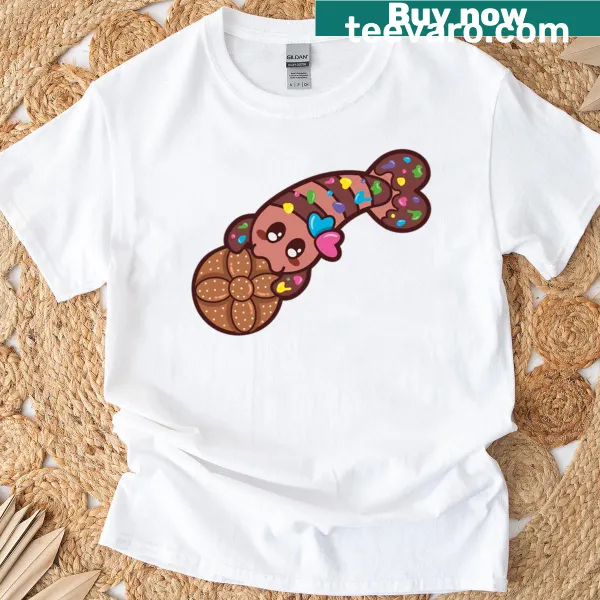 Cartoon-style t-shirt featuring a cookie shrimp and Day of the Dead bread