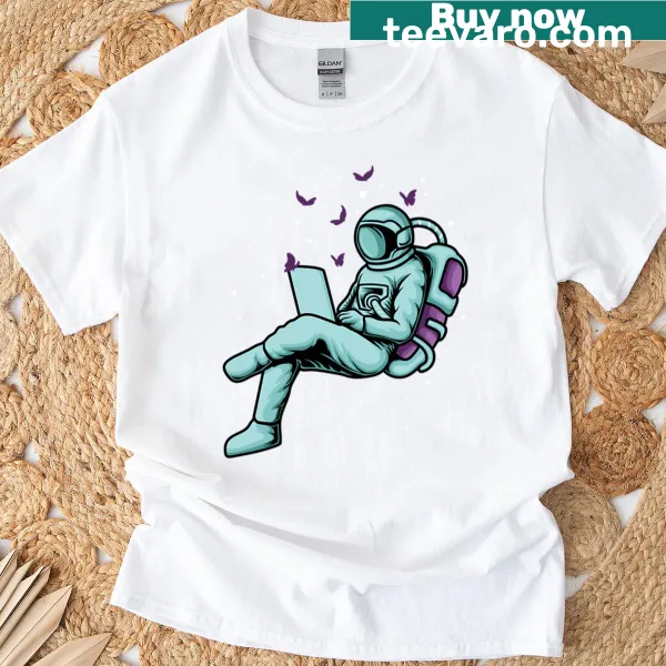 Astronaut on the moon using a laptop graphic T-shirt