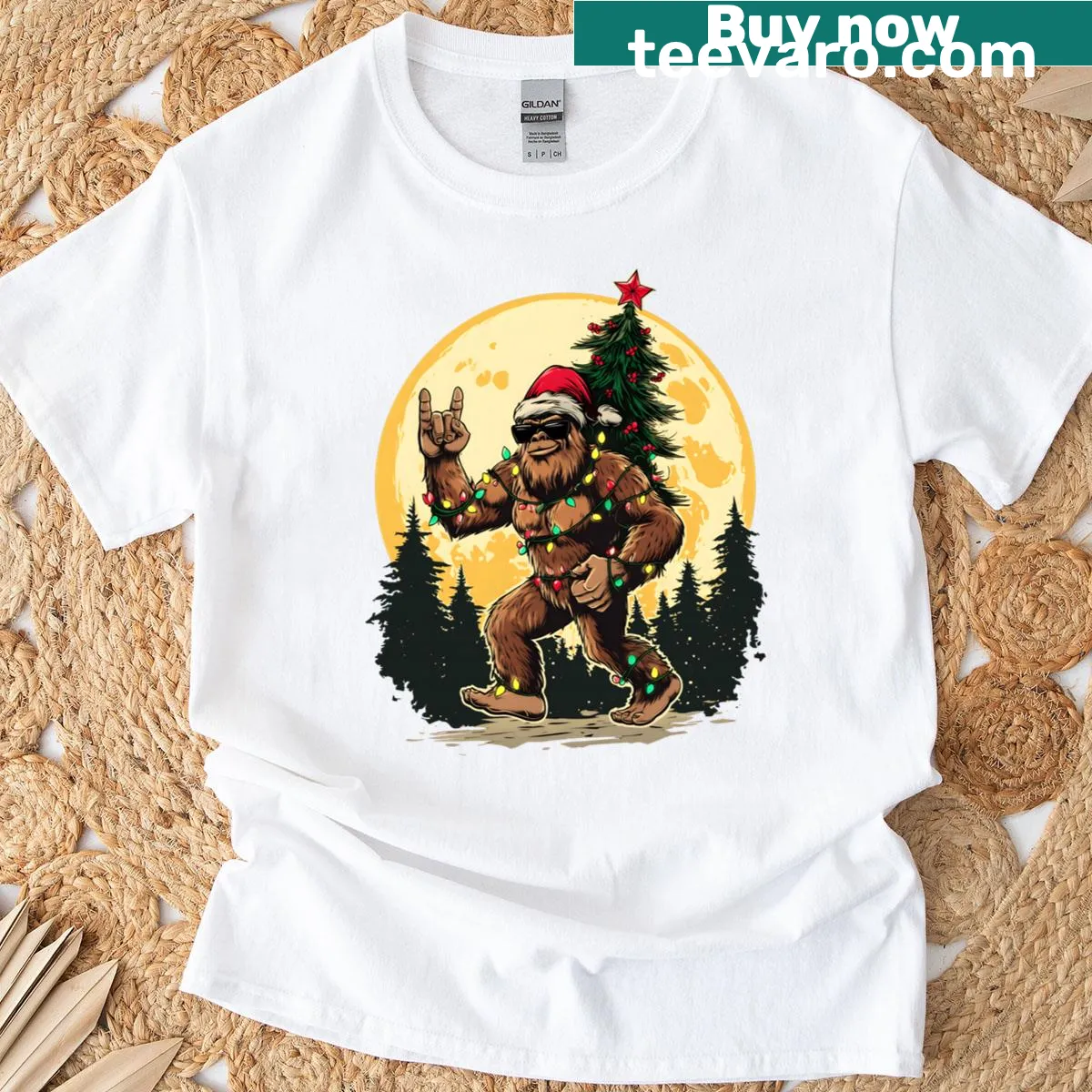 Funny Bigfoot with Christmas tree and lights graphic — on a men's t-shirt