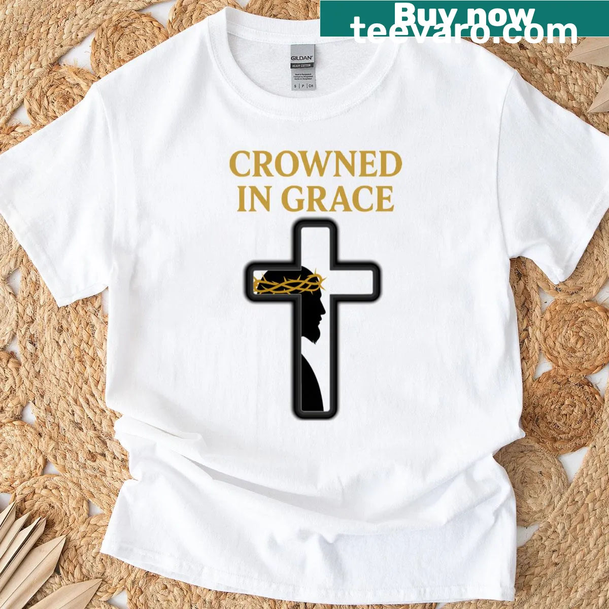 Golden cross with Jesus silhouette and typography design — on a men's t-shirt