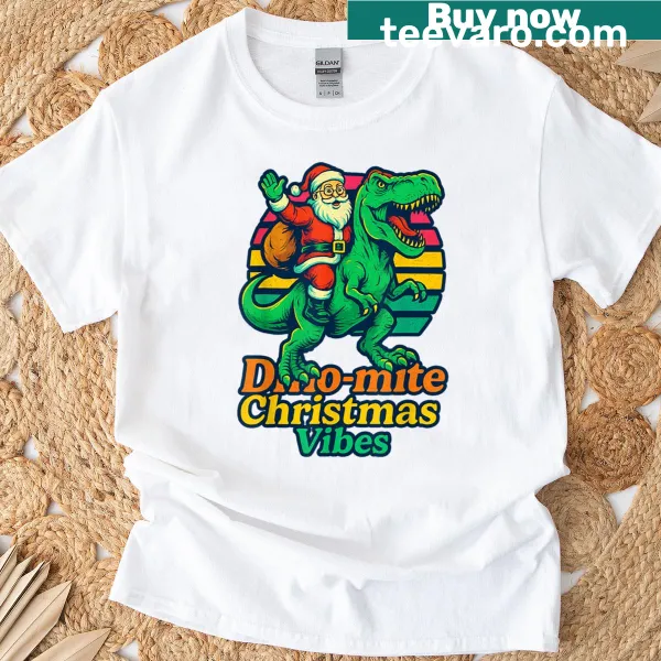 Santa riding T-rex in Christmas themed t-shirt