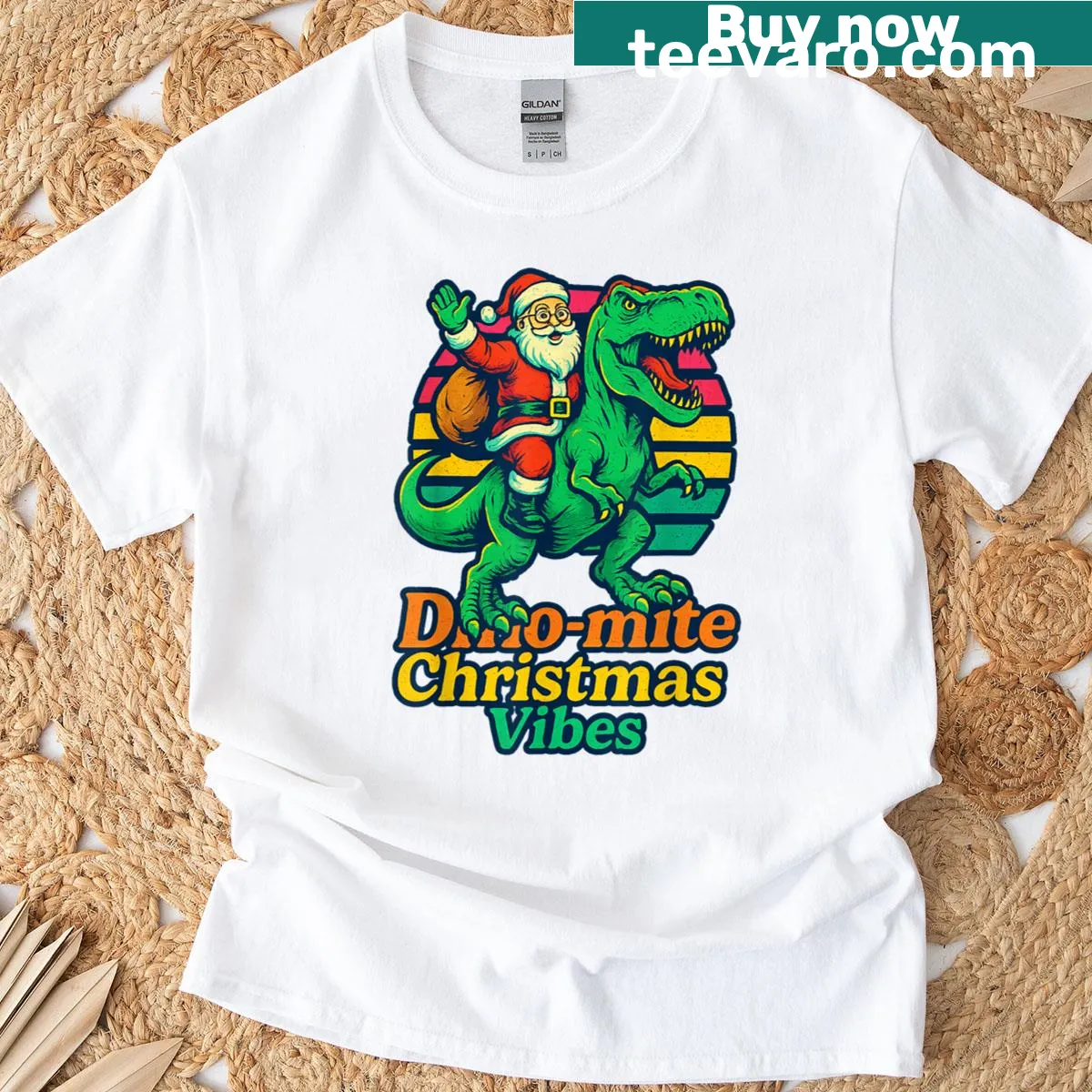 Santa riding T-rex in Christmas themed t-shirt — on a men's t-shirt