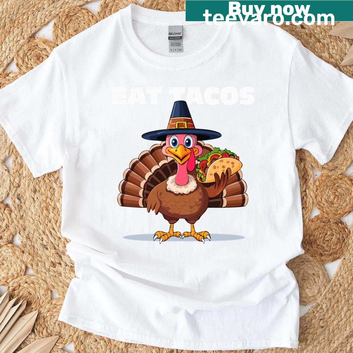 Humorous T-shirt with a turkey holding a taco for Thanksgiving. — on a men's t-shirt