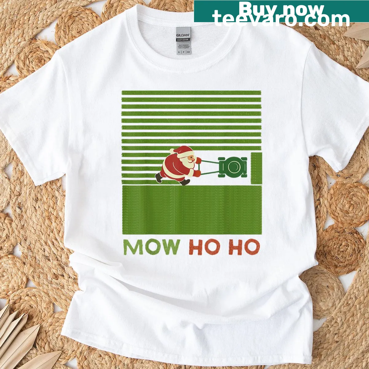 Funny Christmas t-shirt with Santa mowing lawn design — on a men's t-shirt