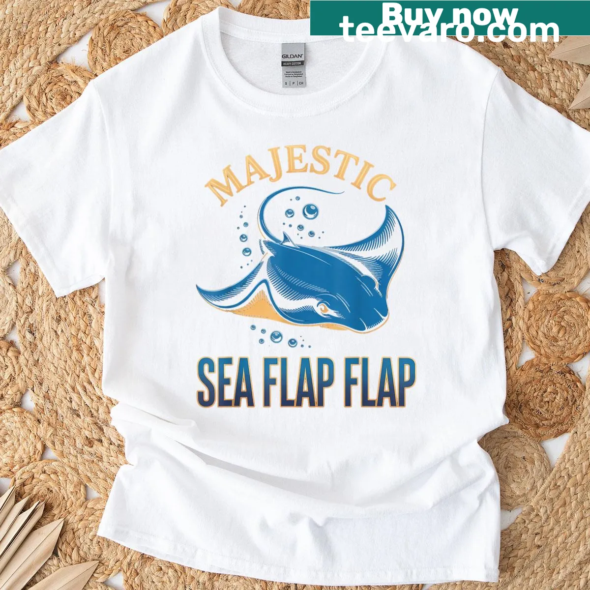 T-shirt featuring a whimsical manta ray illustration. — on a men's t-shirt