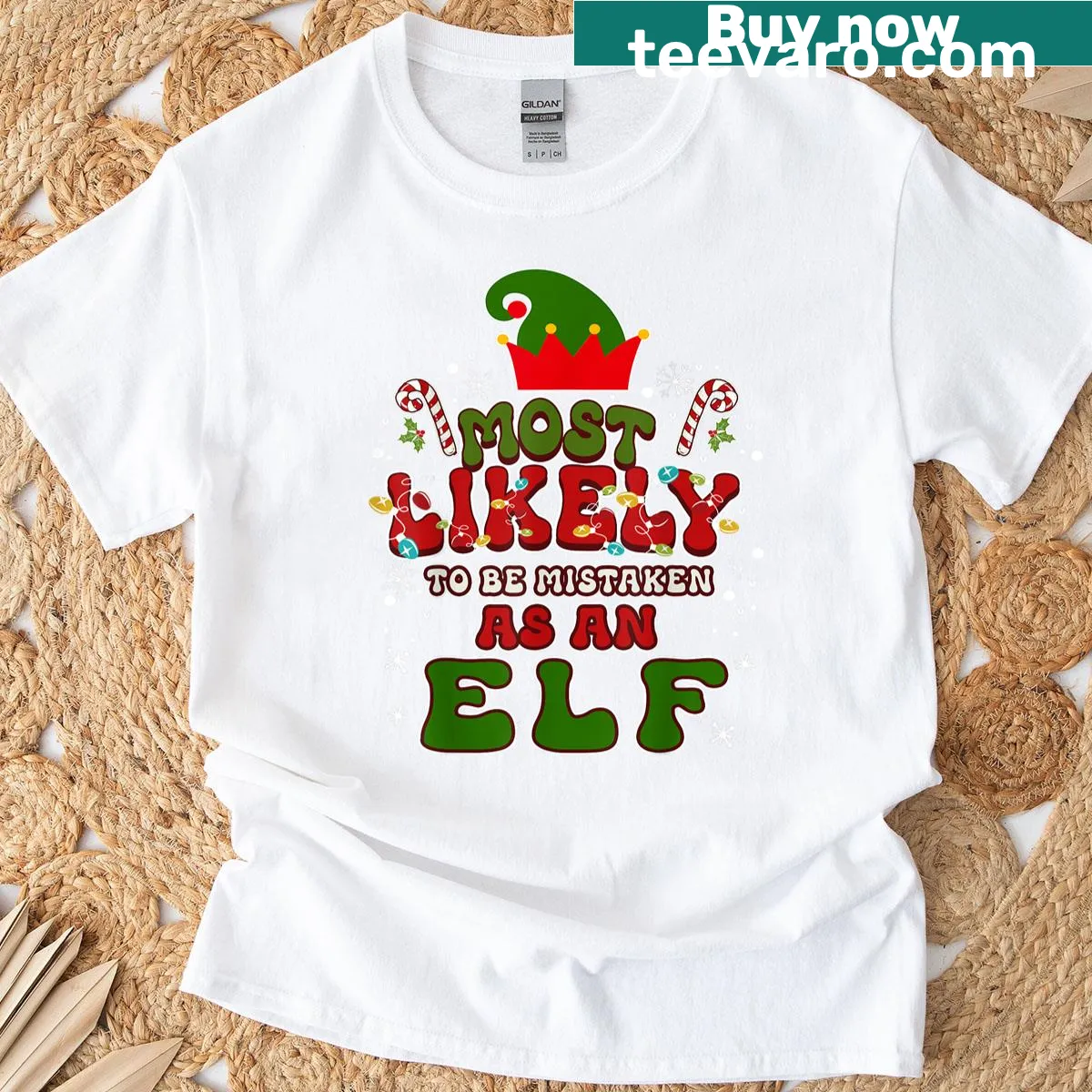 Funny Christmas shirt saying 'Most Likely To Be Mistaken As An Elf' — on a men's t-shirt