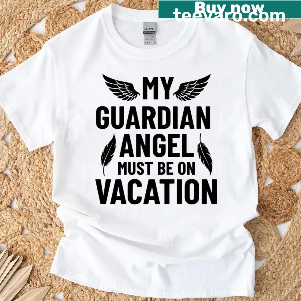 Funny T-shirt with the phrase 'My Guardian Angel Must Be On Vacation' in playful typography