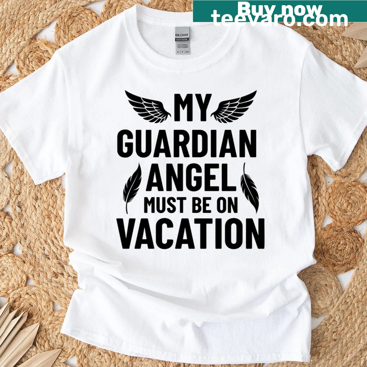 Funny T-shirt with the phrase 'My Guardian Angel Must Be On Vacation' in playful typography — on a men's t-shirt