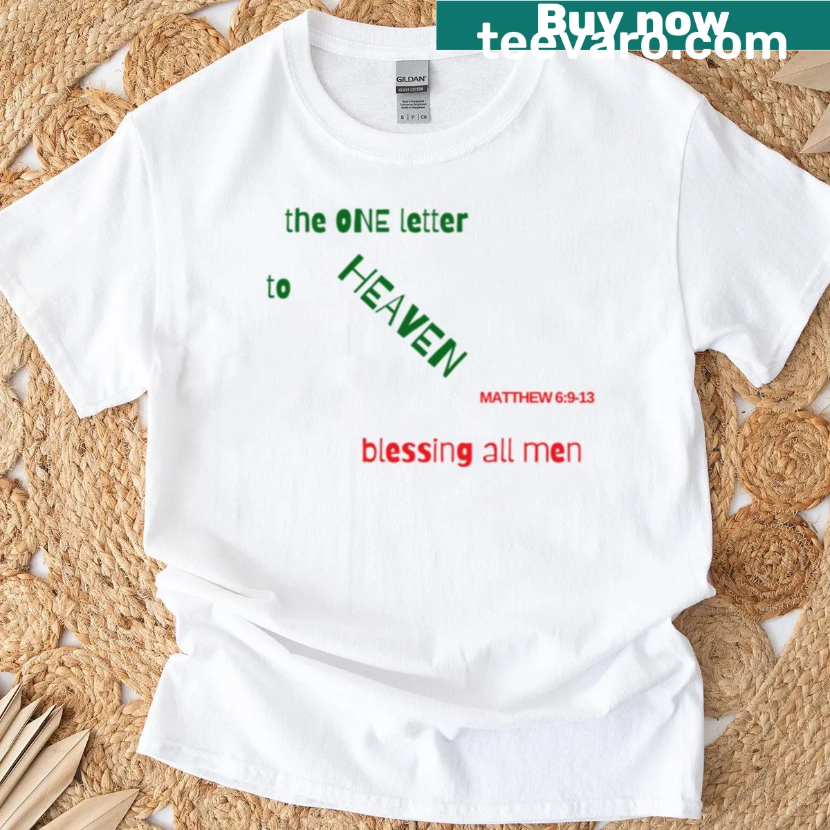 Minimalist typography design of a letter from the Lord's Prayer on T-shirt — on a men's t-shirt
